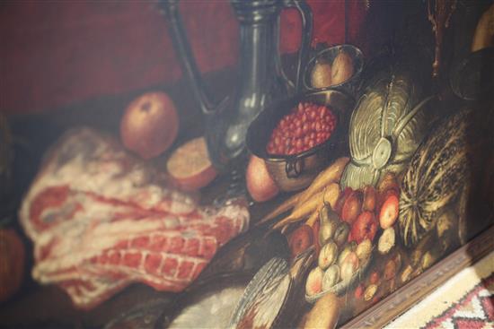 Manner of Giovanni Battista Ruoppolo (1629-1693) Still life of vegetables, meat, fruit and poultry on a table top 32 x 65in.